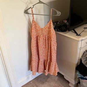 orange and white polka dot dress